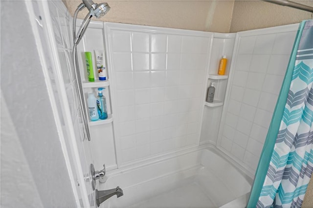 bathroom featuring shower / tub combo