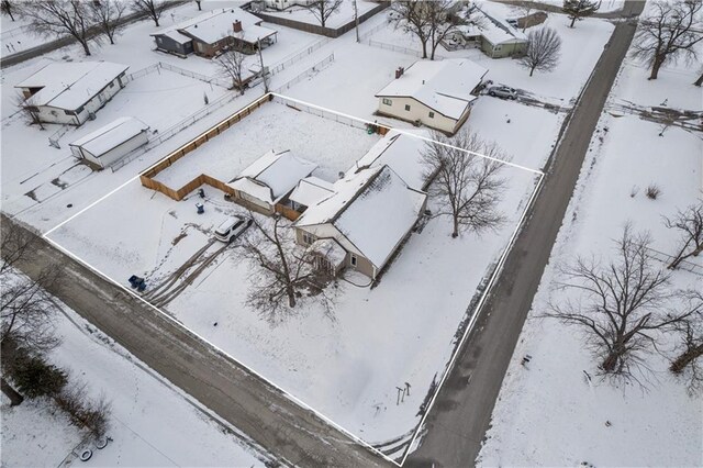 401 N Vine, Caney, KS 67333 - snowy aerial view with a residential view