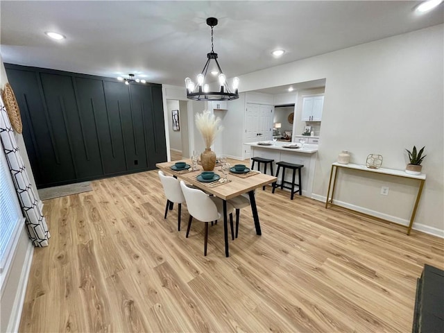 dining area featuring light wood-type flooring