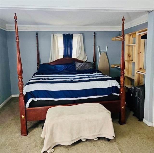 carpeted bedroom with crown molding