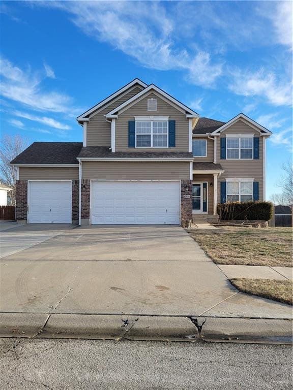 view of front of property featuring a garage