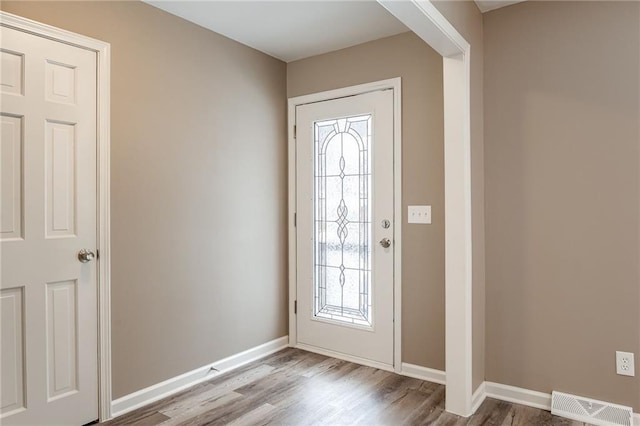 entryway with light hardwood / wood-style flooring