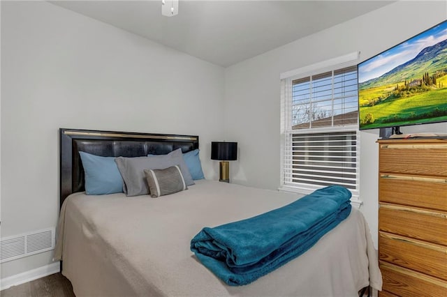 5312 Woodland Ave, Kansas City, MO 64110 - bedroom featuring hardwood / wood-style flooring