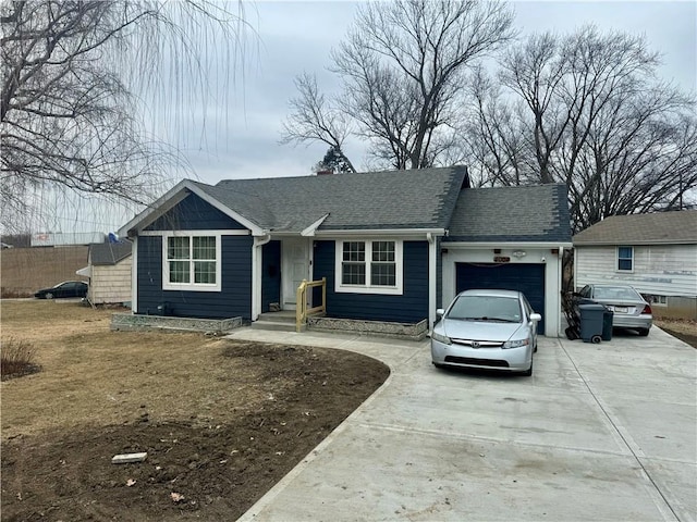 ranch-style house featuring a garage