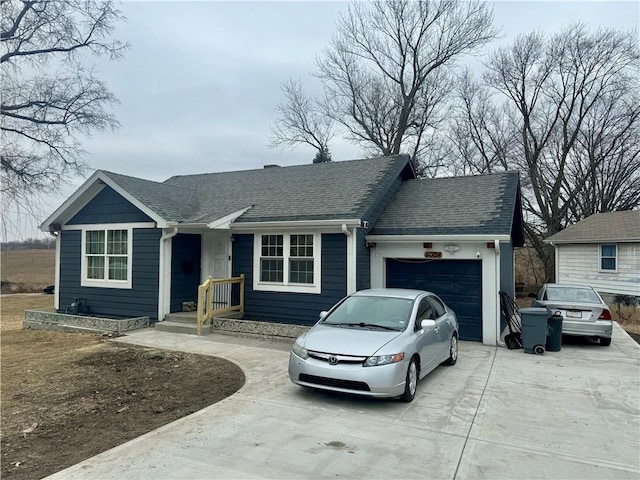 ranch-style home with a garage