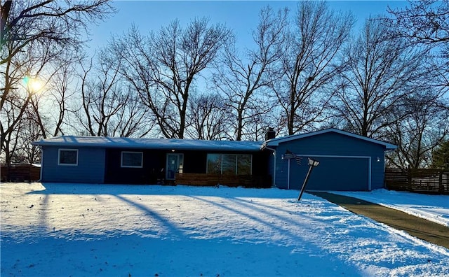 single story home featuring a garage