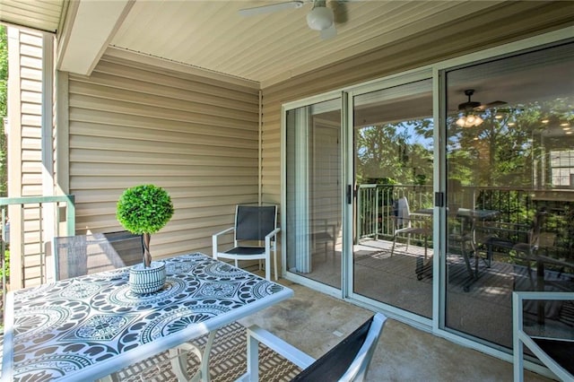 view of patio / terrace featuring ceiling fan