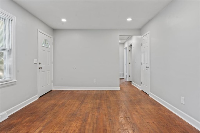 foyer entrance featuring wood-type flooring