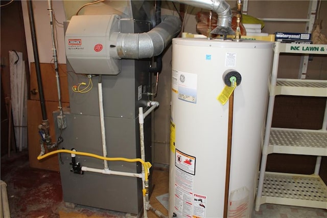 utility room with heating unit and gas water heater