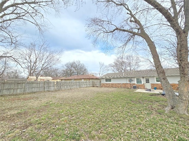 view of yard featuring a patio area and fence private yard