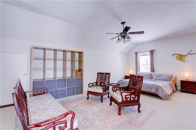 bedroom with lofted ceiling, ceiling fan, carpet, and baseboards