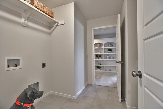 clothes washing area featuring electric dryer hookup and washer hookup