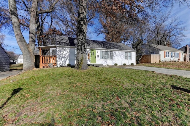 ranch-style house with a front yard