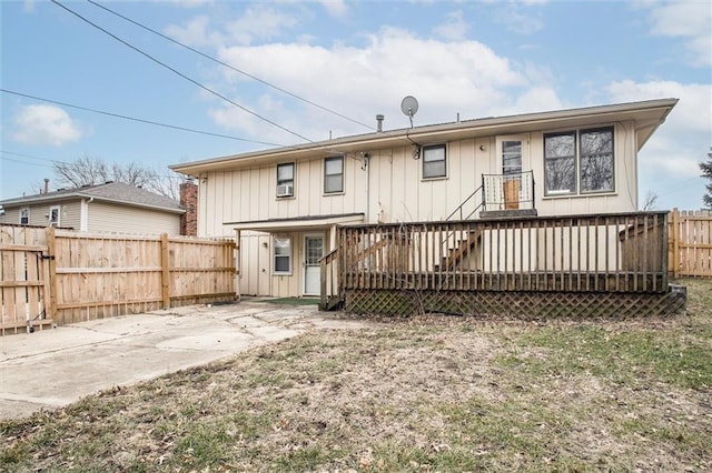 rear view of house with a deck