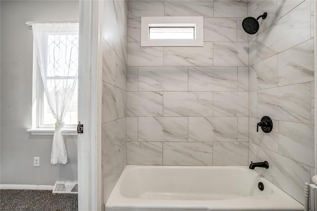 full bathroom with visible vents, shower / washtub combination, and baseboards