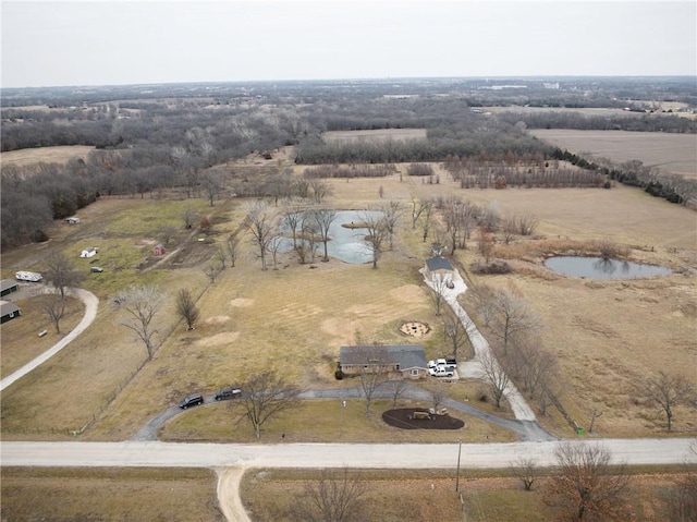 bird's eye view with a rural view and a water view