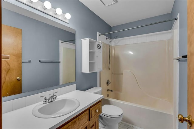 full bathroom featuring vanity, shower / bathtub combination, and toilet