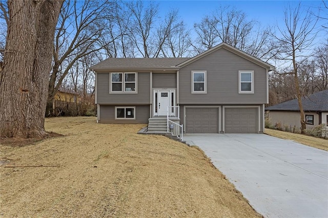 raised ranch featuring a garage