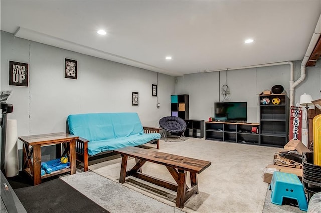 living room featuring recessed lighting and carpet flooring