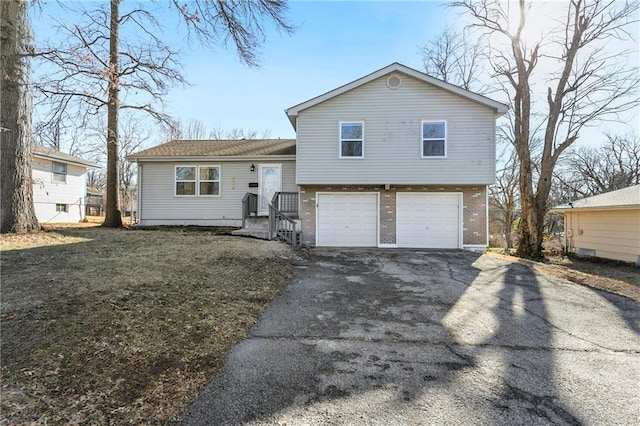 split level home with a garage