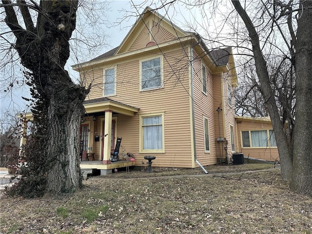 513 S Business Highway 13, Lexington, MO 64067 - view of front of home with a porch and cooling unit