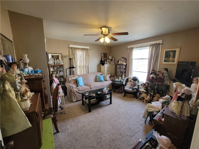513 S Business Highway 13, Lexington, MO 64067 - living room with carpet and a ceiling fan