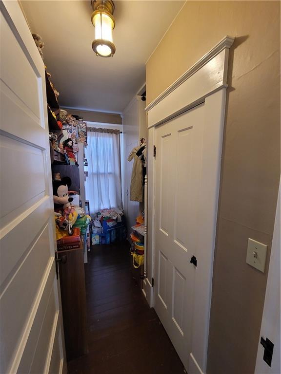 513 S Business Highway 13, Lexington, MO 64067 - spacious closet with dark wood finished floors