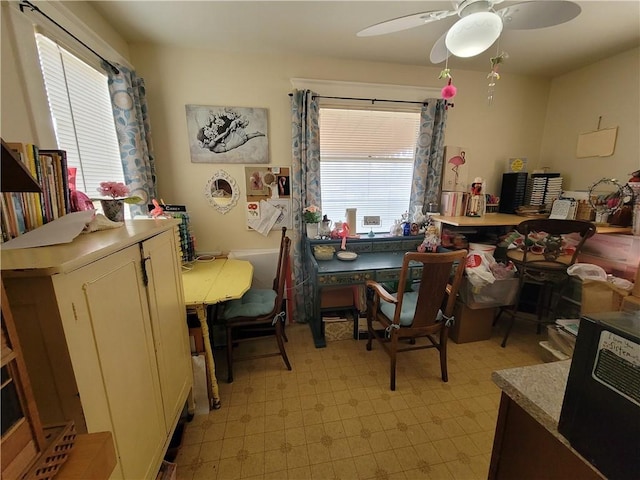 513 S Business Highway 13, Lexington, MO 64067 - dining room with plenty of natural light, light floors, and ceiling fan