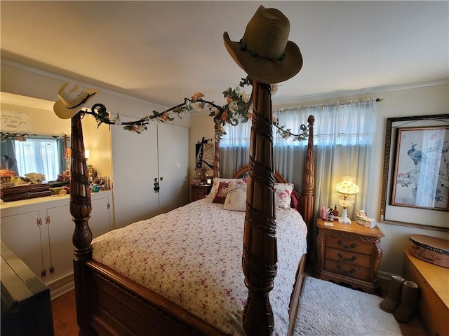 513 S Business Highway 13, Lexington, MO 64067 - bedroom featuring multiple windows and ornamental molding