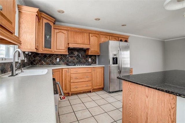 7924 Roe Ave, Prairie Village, KS 66208 - kitchen featuring stainless steel refrigerator with ice dispenser, crown molding, tasteful backsplash, a sink, and light tile patterned floors