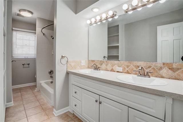 7924 Roe Ave, Prairie Village, KS 66208 - full bath with a sink, tile patterned floors, and backsplash