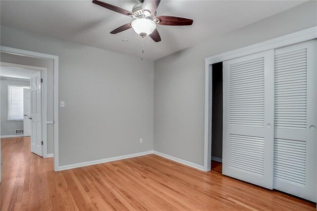 7924 Roe Ave, Prairie Village, KS 66208 - unfurnished bedroom with baseboards, a closet, light wood-type flooring, and visible vents
