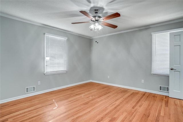 7924 Roe Ave, Prairie Village, KS 66208 - unfurnished room featuring a ceiling fan, baseboards, visible vents, and light wood-style flooring