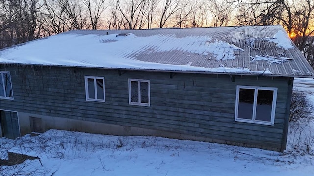 11425 45th Hwy N, Platte City, MO 64079 - view of snowy exterior with metal roof