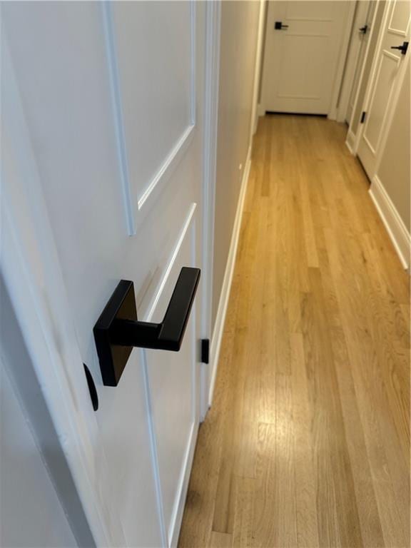 hallway featuring light hardwood / wood-style floors