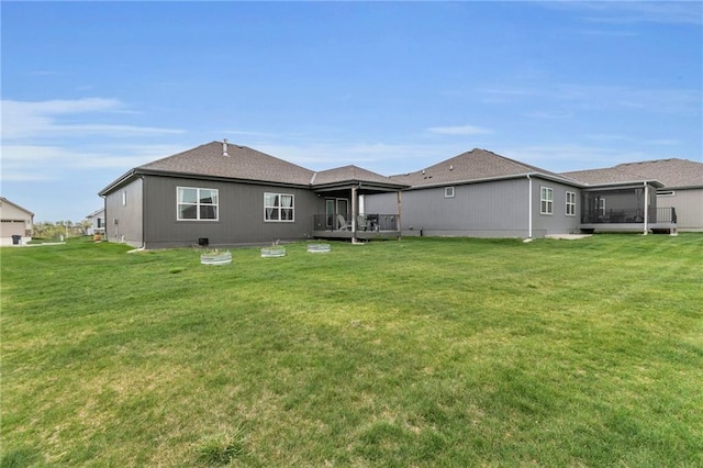 15171 W 173rd St, Olathe, KS 66062 - back of property featuring a yard and a sunroom