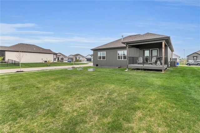 15171 W 173rd St, Olathe, KS 66062 - back of property with a yard and a shingled roof