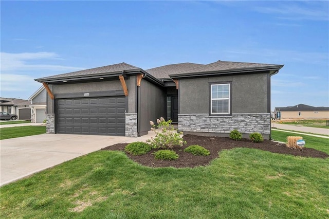 15171 W 173rd St, Olathe, KS 66062 - prairie-style house featuring an attached garage, stone siding, a front yard, and driveway