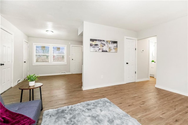 sitting room featuring hardwood / wood-style floors