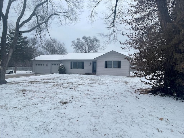 single story home with a garage