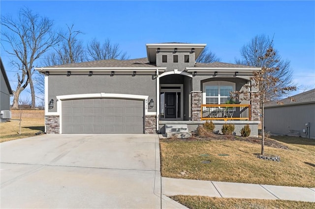 view of front of home featuring stucco siding, concrete driveway, an attached garage, a front yard, and stone siding