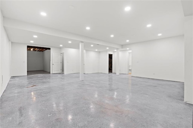 finished basement with recessed lighting