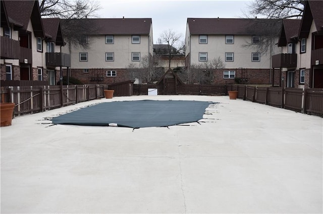 view of snow covered pool