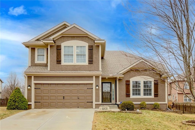 traditional-style house with stucco siding, a front lawn, driveway, fence, and an attached garage