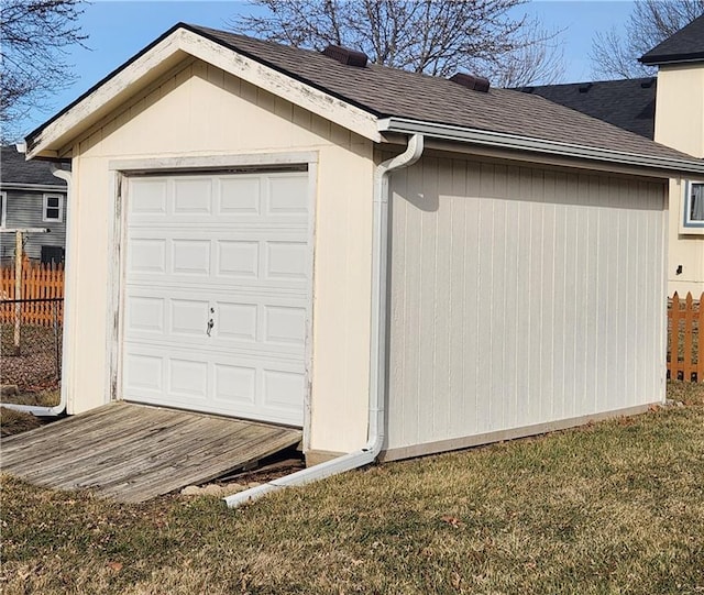 garage with fence