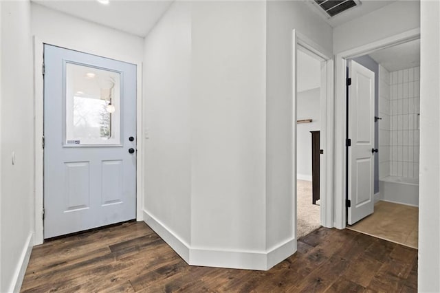 entryway featuring dark wood-type flooring