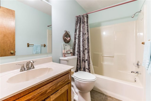 full bath featuring tile patterned floors, toilet, a textured ceiling, shower / tub combo, and vanity