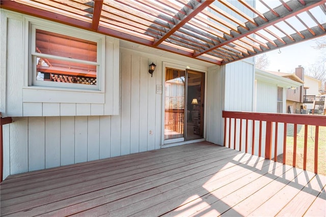 wooden terrace with a pergola