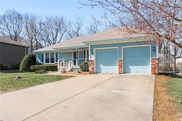 view of front facade featuring brick siding, roof with shingles, covered porch, driveway, and an attached garage