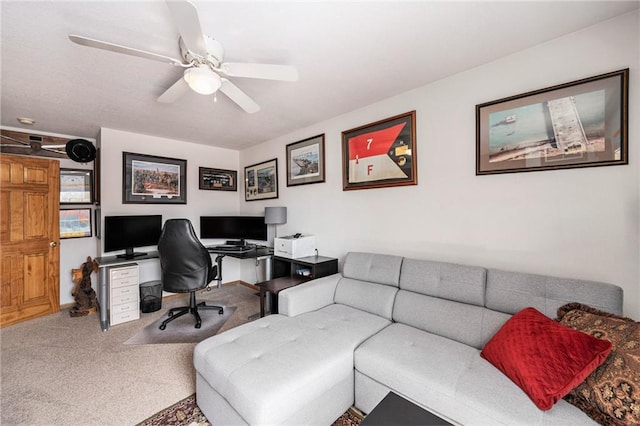 office space with carpet floors and a ceiling fan